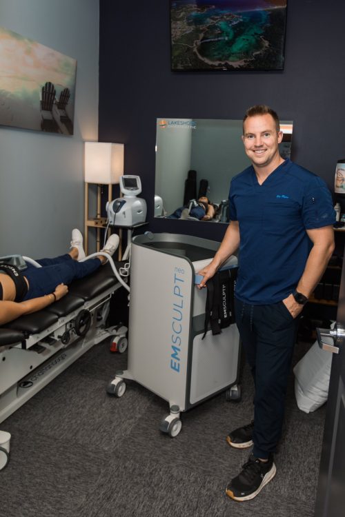 dr ryan with emsculpt neo machine in sarasota